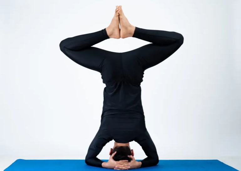 top-7-advance-yoga-poses-bound-angle-headstand-pose